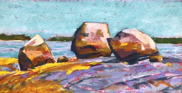 Three colorful boulders with ocean and sky