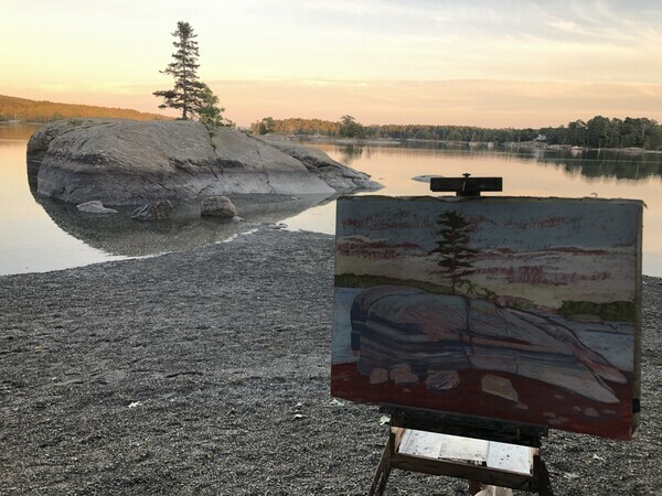 Easel in front of the scene that’s in the painting